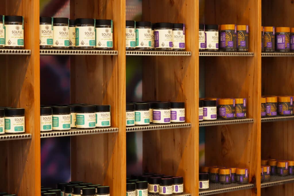 San Francisco flower wall shows jars of flower.